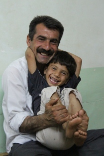 Hama and his dad. Parents and children are very very affectionate; it warms my heart to see it.